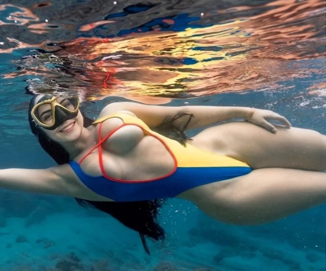 Já pensou em mergulhar e dar de cara com a pequena sereia de verdade?